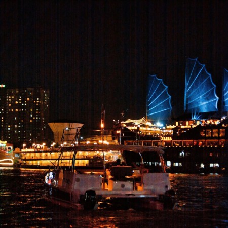 Saigon From A Very Different Perspective - When The City Lights Up On The Shimmering River